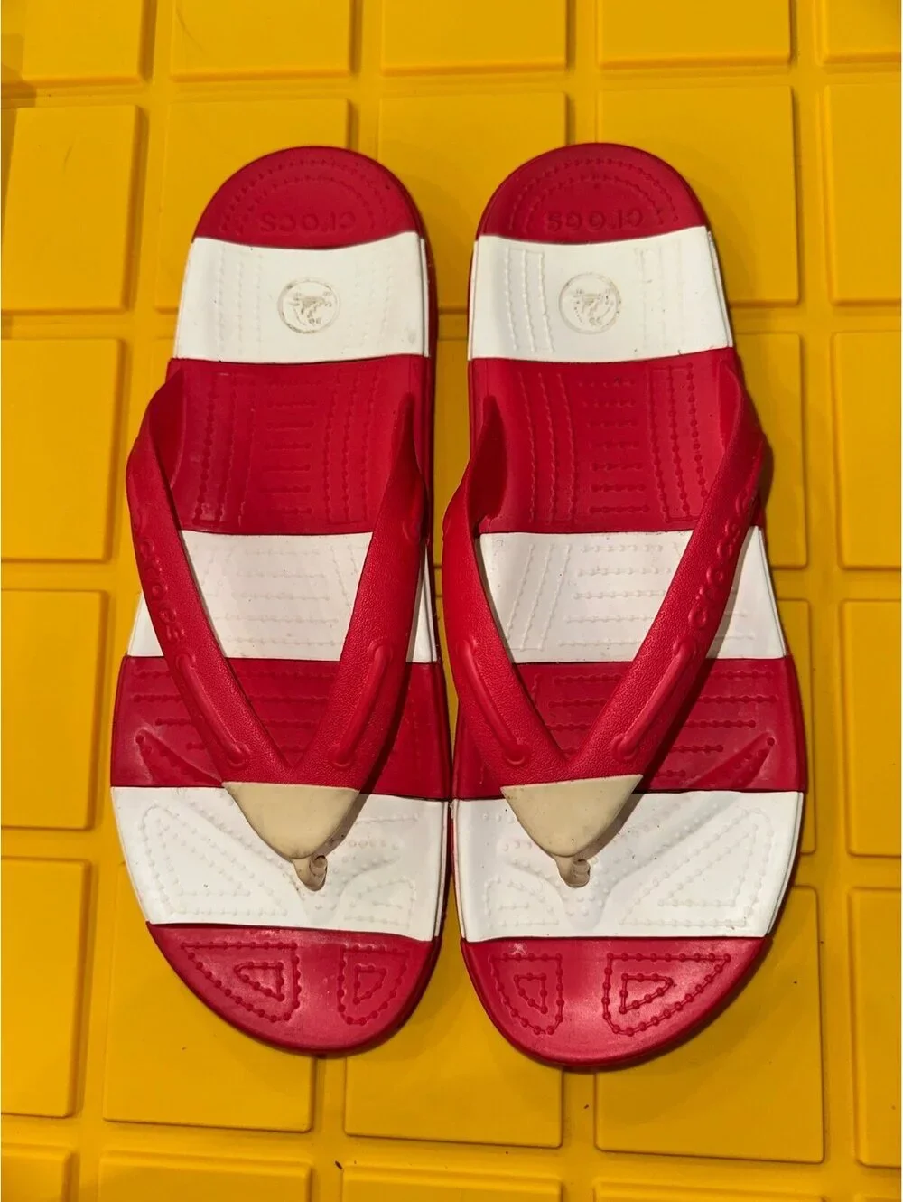 Crocs red and white flip flops size men’s 11